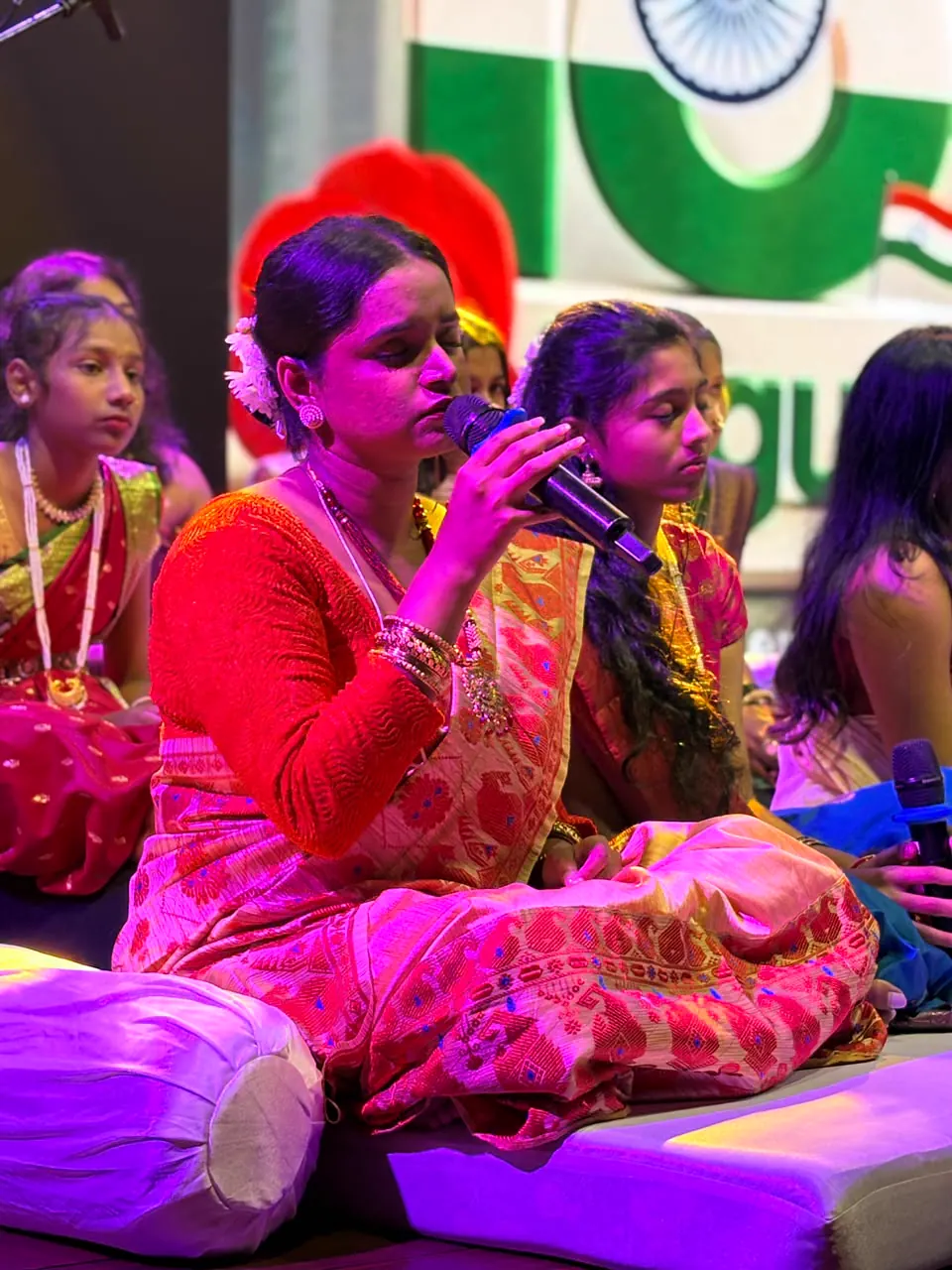 A singer leading worship during Cultural Sunday.
