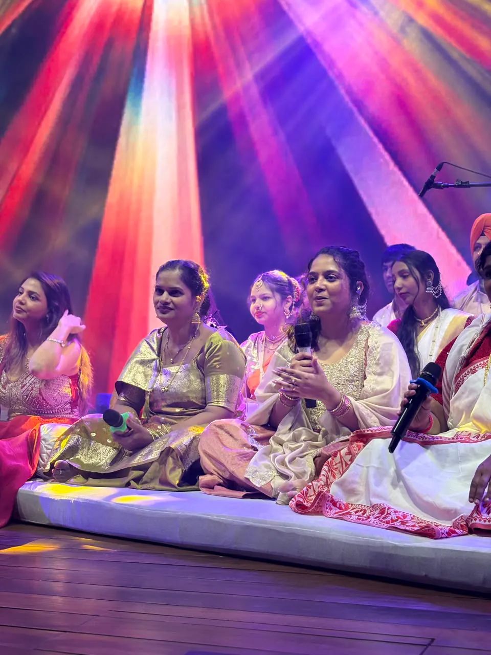Singers seated together during Cultural Sunday.